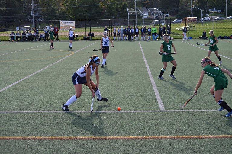 Senior Frankie Tossona sets up a pass in Eagle territory. 