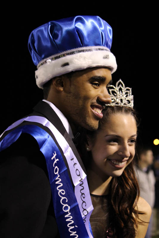 Chase Childs and Kate Lombardo celebrate their crowning as 2014-15 Homecoming King and Queen of North Penn High School