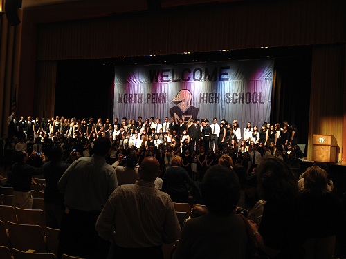 Proud parents watch as their students join the ranks of NHS at a previous induction ceremony. 