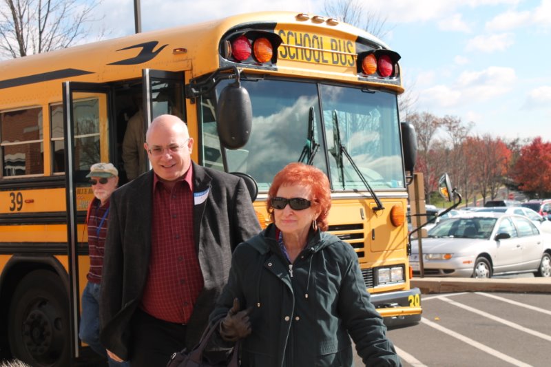 TO THE FUTURE! Neal and Barbarann Voron depart the Bus to the Future at North Penn High School on Friday, November 14, 2014.