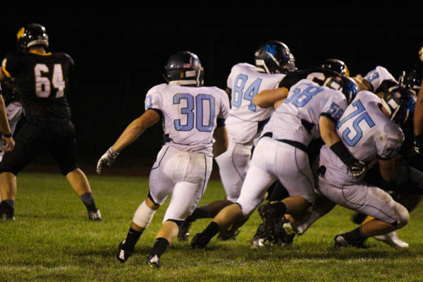 CHARGING INTO THE POSTSEASON: The Knights Justin Ostapovich carries the ball in an early season clash with Archbishop Wood. North Penn has won their last 5 games and will enter the District 1 tournament as the #9 seed. 