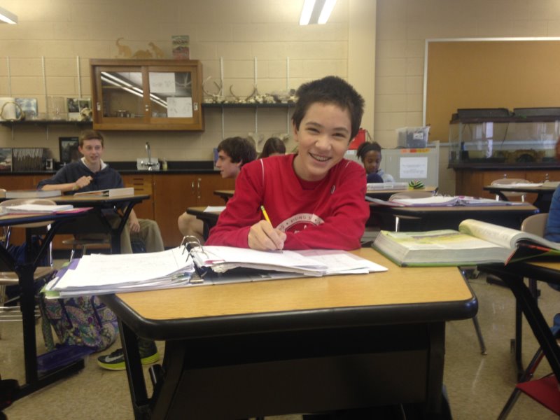 All smiles - 12 year old NPHS student Jonathan Okasinksi enjoying his work in science class. 