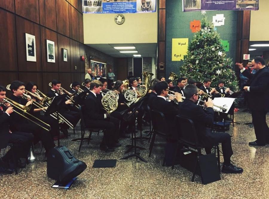 Band director Mr. Michael Britcher leads North Penn High Schools Brass Ensemble at the close of 2014s annual Winter Concert. (Katie Solomon)