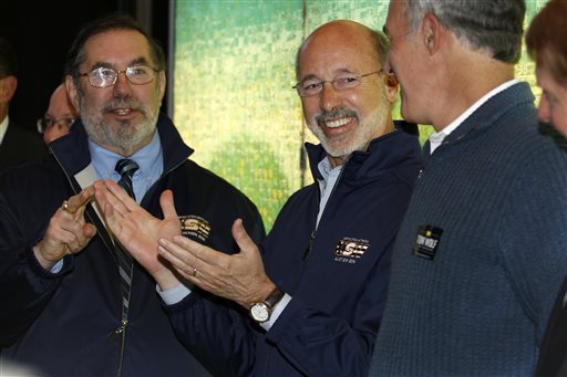 Pennsylvania Democratic gubernatorial candidate Tom Wolf, center, joins United Steelworkers President Leo Gerard, left, and U.S. Senator Bob Casey, D-Pa., at a rally at the United Steelworkers  headquarters in downtown Pittsburgh, Monday, Nov. 2, 2014. Wolf is looking to unseat incumbent Republican Governor Tom Corbett in Tuesdays mid-term election. (AP Photo/Gene J. Puskar)