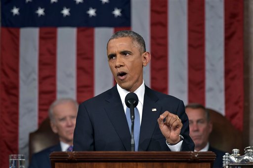 President Barack Obama delivers his State of the Union address to a joint session of Congress on Capitol Hill on Tuesday, Jan. 20, 2015, in Washington. Vice President Joe Biden and House Speaker John Boehner of Ohio, listen in the background. (AP Photo/Mandel Ngan, Pool)