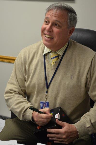 Bill Bartle accepts an award from the United Way in 2013. Bartle has been named as the next AD at NPHS, effective Monday, January 12, 2015