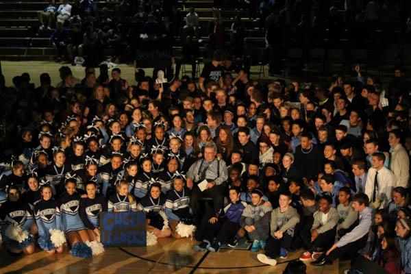 THANKS DOC! North Penn athletes surround athletic director Don Ryan, during his retirement tribute at NPHS on January 9th.