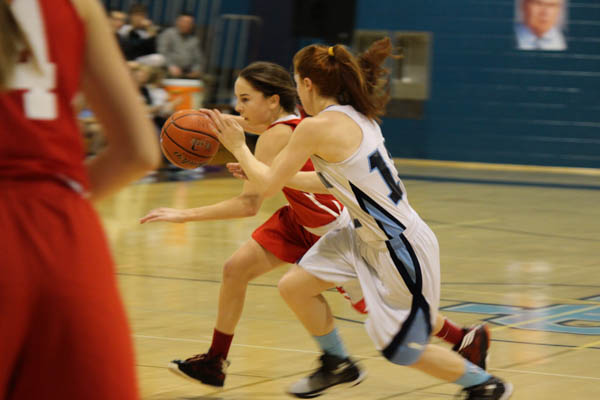 North Penns Taylor Thames defends against Souderton on Friday, January 9th at NPHS.