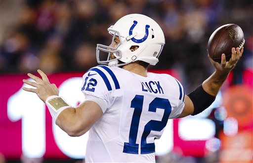 FILE - In this Nov. 3, 2014, file photo, Indianapolis Colts quarterback Andrew Luck (12) throws a pass against the New York Giants during the first half of an NFL football game in East Rutherford, N.J. No Tom Brady-Peyton Manning rematch this time. Instead, it will be Brady and Andrew Luck meeting again in a matchup of star quarterbacks when the New England Patriots host the Indianapolis Colts in the AFC championship game Sunday. (AP Photo/Kathy Willens, File)