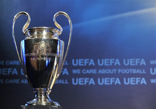 The Champions League trophy is shown during the drawing for the UEFA Champions League  2009/10 third qualifying round at the UEFA headquarters in Nyon, Switzerland, Friday, July 17, 2009. (AP Photo/Keystone/Martial Trezzini)