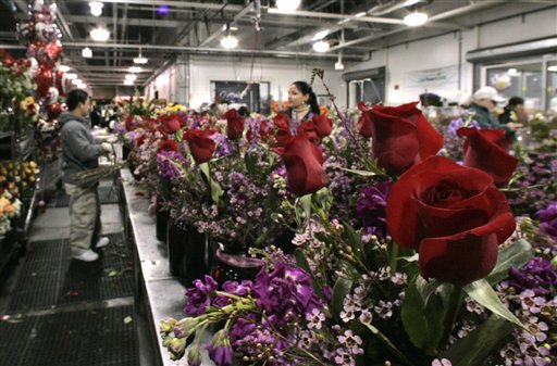 Workers at 1-800-FLOWERS.COM prepare floral arrangements, Tuesday, Feb. 13, 2007, as Valentines Day approaches in Bethpage, N.Y.  (AP Photo/Frank Franklin II)