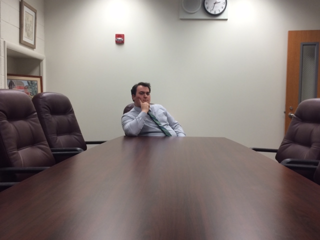 ITS MUNOZ TIME - Max Munoz, NPHS senior, gets comfortable in his new conference room. Its Munoz for principal starting September 4th!