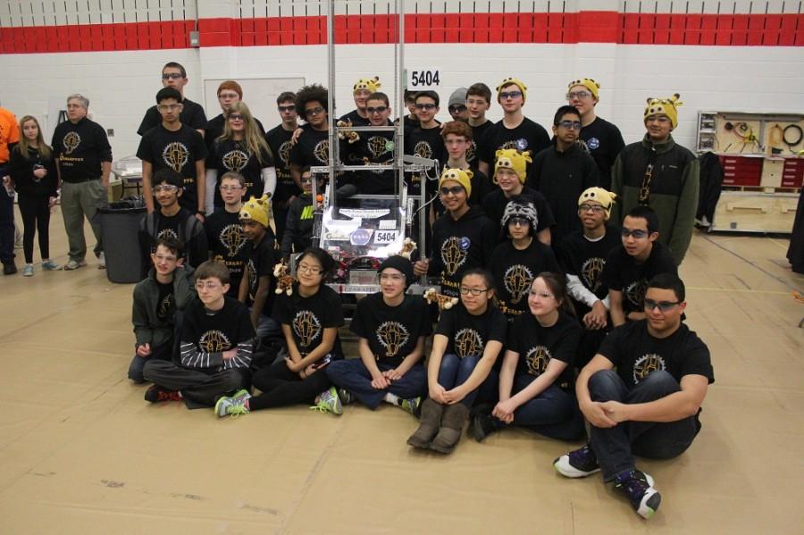 The+Gearaffes+gather+for+a+picture+next+to+their+robot+at+the+Hatboro+Horsham+competition.