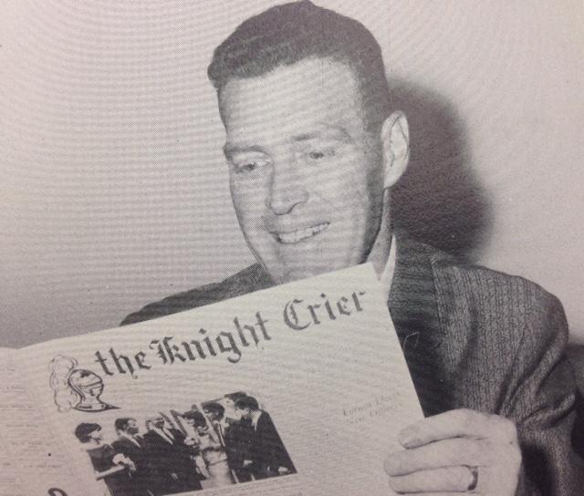 Mr. Thomas Vizzard, advisor to the Knight Crier reads the finished product with a smile of satisfaction.
 