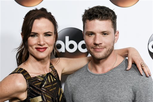 FILE - In this Jan. 14, 2015 file photo, actress Juliette Lewis, left, and actor Ryan Phillippe arrive at the Disney/ABC Television Group 2015 Winter TCA Party in Pasadena, Calif. Lewis plays Detective Andrea Cornell and Ryan plays Ben Garner on the ABC series Secrets and Lies airing Sundays at 9 p.m. ET. (Photo by Richard Shotwell/Invision/AP, File)