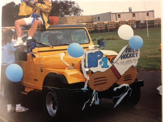 North Penn students ride a field hockey-themed float in the high schools 1989 Homecoming parade, a tradition that has since faded.