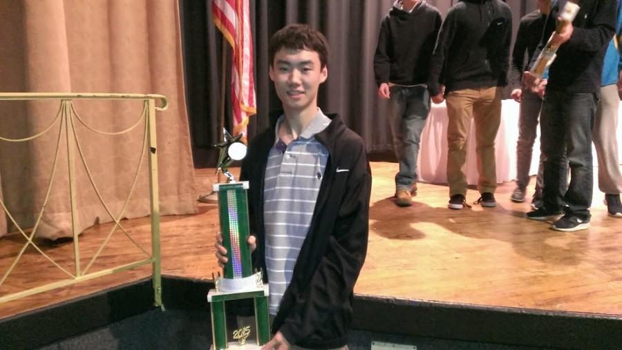 Sophomore Chris Yang holds a first place trophy this past March at the Pennsylvania state competiton.