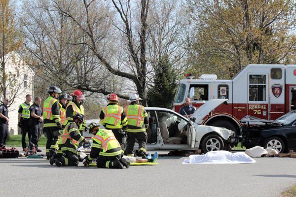 Reenactment - Emergency responders create the scene of a fatal DUI crash at NPHS on Wednesday morning as part of the annual DUI reenactment program for NP seniors. 
