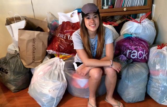 The clothes keep coming - Pham piles up her donations from people who are eager to clean out their closets and help a worthy cause.