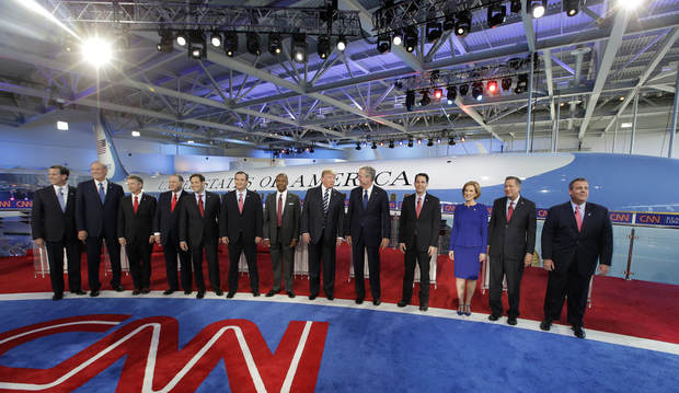 (AP Photo) Republican presidential candidates, from left, former Pennsylvania Sen. Rick Santorum, former New York Gov. George Pataki, Sen. Rand Paul, R-Ky., former Arkansas Gov. Mike Huckabee, Sen. Marco Rubio, R-Fla., Sen. Ted Cruz, R-Texas, retired neurosurgeon Ben Carson, businessman Donald Trump, former Florida Gov. Jeb Bush, Wisconsin Gov. Scott Walker, businesswoman Carly Fiorina, Ohio Gov. John Kasich, and New Jersey Gov. Chris Christie take the stage during the CNN Republican presidential debate at the Ronald Reagan Presidential Library and Museum on Wednesday, Sept. 16, 2015, in Simi Valley, Calif.