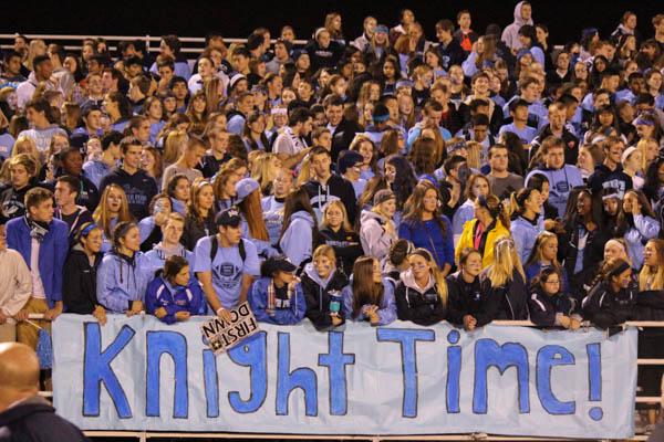 NP STUDENTS cheer on at the NP football homecoming game in 2014. The 2015 homecoming king and queen semi finalists were announced this morning. 