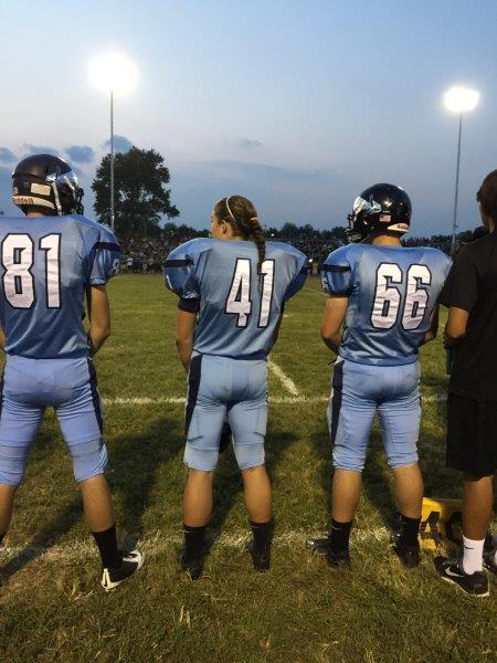 Kelly Macnamara, a NPHS sophomore, stands on the sidelines during North Penns game against LaSalle on September 4th. McNamara is the first female football player in school history.