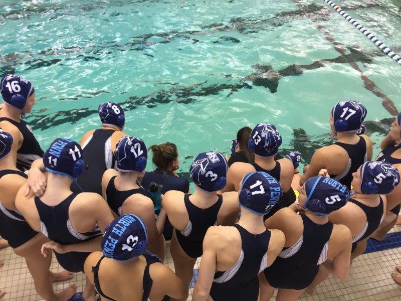 The North Penn Maidens huddle up during their recent game against rival Souderton.