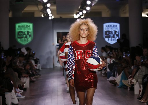 IMAGE DISTRIBUTED FOR HARLEM GLOBETROTTERS - Models walk the runway wearing Harlem Globetrotters-inspired fashions designed by Angela Simmons, at the annual KIA STYLE360 showcase during New York Fashion Week, Tuesday, Sept. 15, 2015, New York, N.Y. (Photo by Stuart Ramson/Invision for Harlem Globetrotters/AP Images)