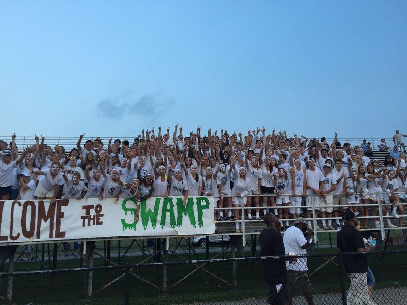 The North Penn student section cheers on the Knights in the football season opener at Crawford Stadium on Friday night.