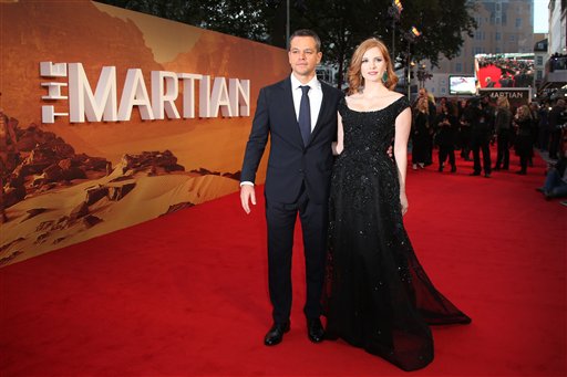 Actors, from left, Matt Damon and Jessica Chastain pose for photographs as they arrive on the red carpet for the European Premiere of, The Martian at a central London cinema, Thursday, Sept. 24, 2015. (Photo by Joel Ryan/Invision/AP)