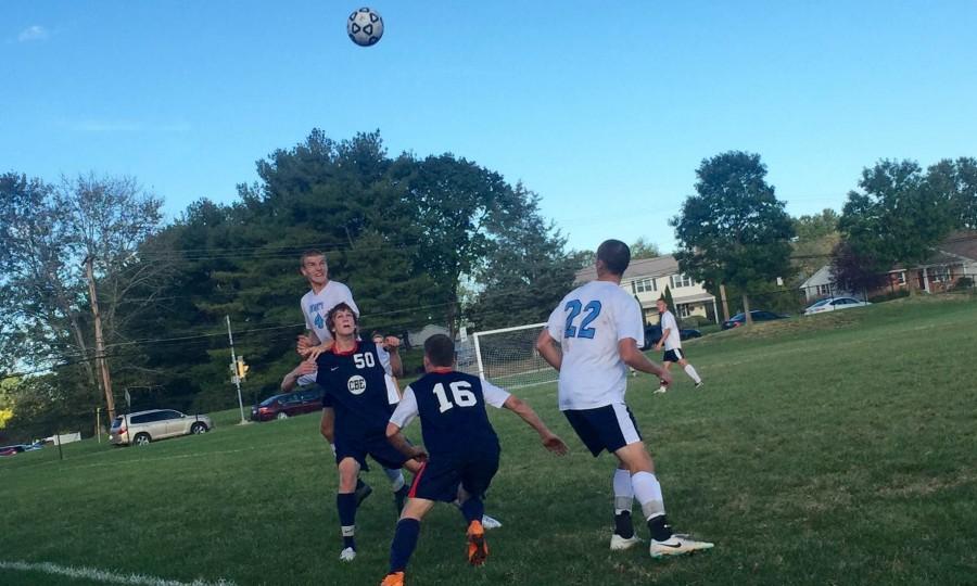 Junior defender Noah Kwortnik goes for the header during Tuesdays 1-0 loss