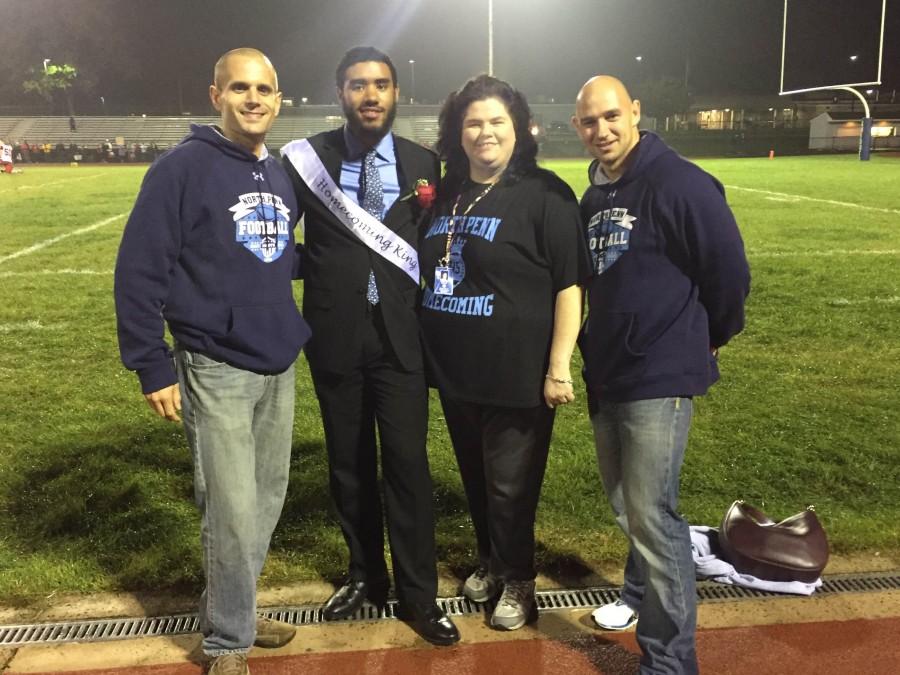 North Penn assistant principal Pete Nicholson,  Class of 2015 Homecoming King Chase Childs, and assistant principals Mary Scott and Stefan Muller pose for a picture after Friday nights Homecoming football game