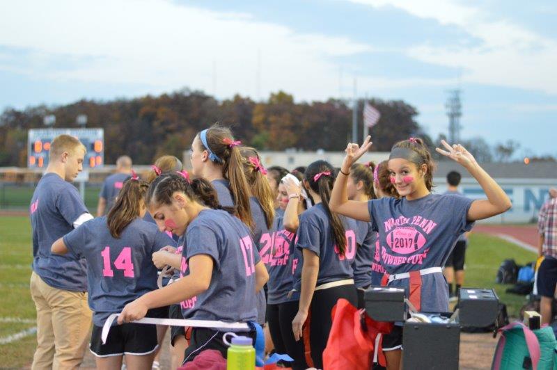 The juniors get ready to take on the sophomores in game 1 of October 22s Powderpuff football game.