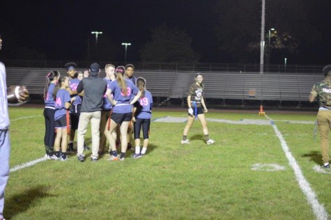 The class of 2017 strategizes before heading back to the line of scrimmage in the NPHS Powderpuff football game held on October 22, 2015 in Crawford Stadium. The juniors won the championship.