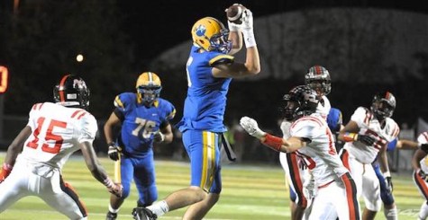 Cary Angeline of Downingtown Eest catches a pass in the Cougars' win over Coatesville.