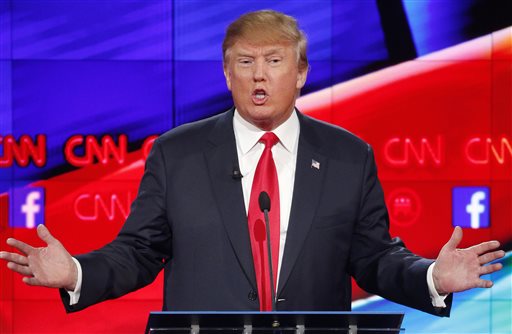 FILE - In this Dec. 15, 2015 file photo, Donald Trump makes a point during the CNN Republican presidential debate at the Venetian Hotel & Casino in Las Vegas. During the debate, Trump stated that since the extremist Islamic State group is using the Internet to recruit; the tech industry needs to find a way to stop them from doing that. (AP Photo/John Locher, File)
