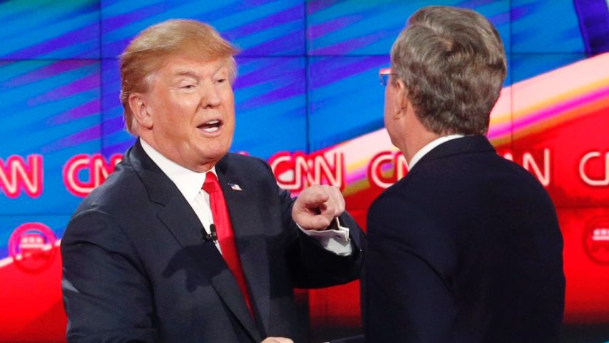 Republican presidential candidates Donald Trump and Jeb Bush respond to each other as U.S. Sen. Ted Cruz (R-TX) listens during the CNN Republican presidential debate on December 15, 2015. 
(AP Images)