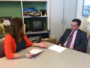 Dietrich sits in on a department meeting with the Director of School/Community Engagement, Christine Liberaski. 