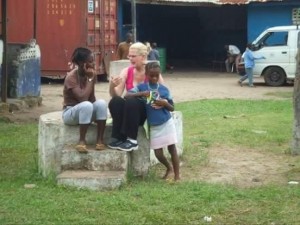 In Africa, before coming to America, Donna Mengel (center) gets to know Maude (right).