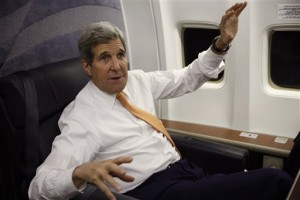 U.S. Secretary of State John Kerry speaks to journalists about his negotiations with Iran upon his arrival from Vienna at Joint Base Andrews in Washington Sunday, Jan. 17, 2016. Four Americans and seven Iranians got tickets to freedom in a prisoner swap playing out alongside the kick-start of an accord lifting heavy international sanctions on Iran in return for its agreement to pull back its nuclear program. A fifth American was released separately. 