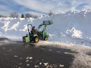 Pile it on! NPHS facilities employee Gene Serianni moves snow from the NPHS parking lot on Monday afternoon.