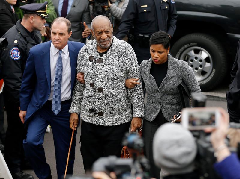 Bill Cosby arrives at court to face a felony charge of aggravated indecent assault  Wednesday, Dec. 30, 2015, in Elkins Park, Pa. Cosby was charged Wednesday with drugging and sexually assaulting a woman at his home 12 years ago. (AP Photo/Matt Rourke)