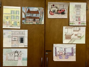 A cabinet in Mrs. Joelle Townsend's room displays the work of Interior Design students.