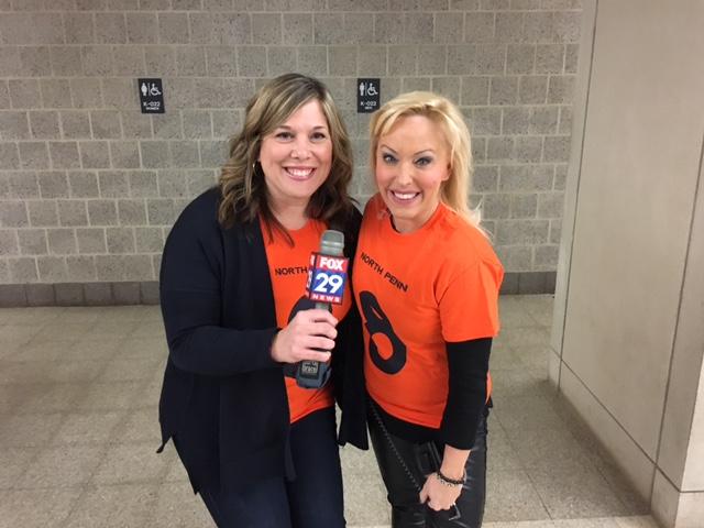 NPHS teacher Amy Young and FOX 29s Jennaphr Frederick share in the excitement of Brandon McManus Day at NPHS. 
