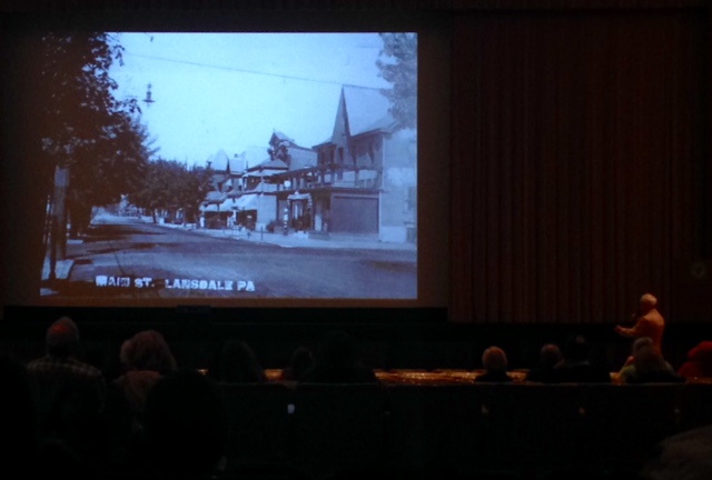 Steve Moyer (bottom right) of the Lansdale Historical Society presents the popular Then You Saw It, Now You Dont program in the high school auditorium Wednesday night.