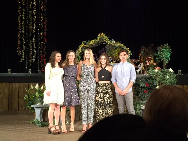 Fashion career study students (L to R) Lauren Whelan, Nicole Owens, Lauren Hall, Heather Cunningham, and Carter Yanagawa model their designs in the fashion show  they helped organize.