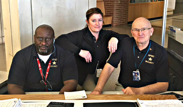 Rebecca Glick-Luby, NPHS security guard (center) enjoys her work at NPHS because it enables her to help young people in a positive way.