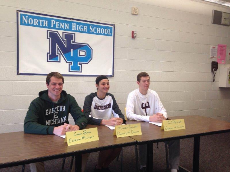 Corey Smith, Mikaela Giuliani and JJ Melchior sign collegiate letters of intent at NPHS on April 14, 2016.