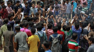 Students in Bangladesh protest following the death of law student Nazimuddin Samad. (AP Images)
