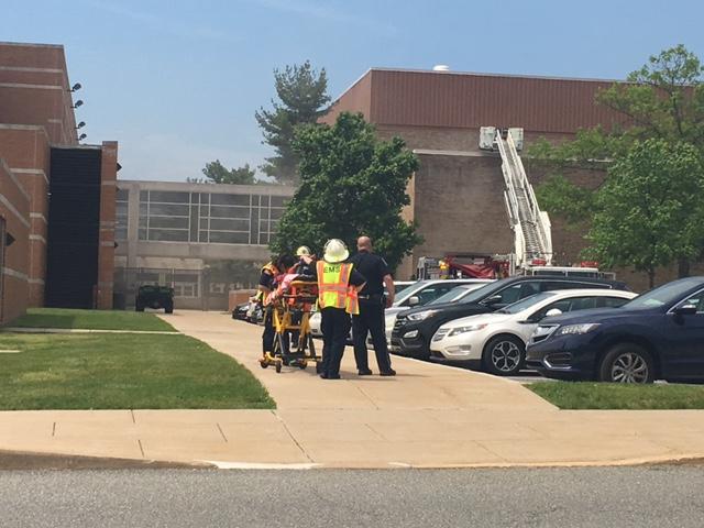 Smoke pours out of the first floor Fpod area of NPHS as emergency personnel arrive on the scene. A two alarm fire caused the evacuation of the building around 11:30am on Tuesday, May 24, 2016.
